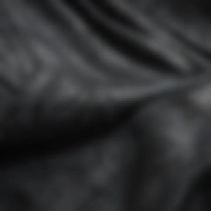 Close-up of the fabric texture showcasing the distressing details