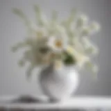 Elegant white round vase adorned with fresh flowers