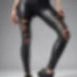 A stylish pair of ripped leggings featuring unique design elements.