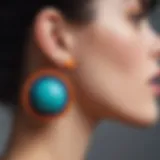 Close-up view of colorful rubber stud earrings showcasing unique designs.