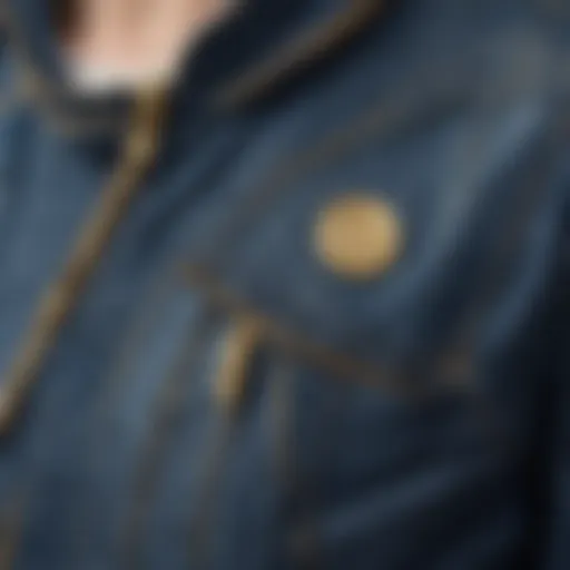 Close-up view of a zipper front jean jacket showcasing intricate stitching